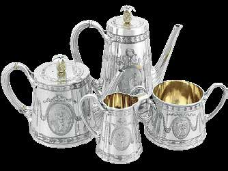 A silver tea set, salvers and silverware